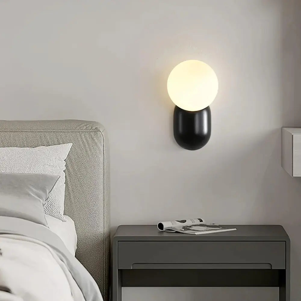 Modern Globe Wall Light Black Metal and Glass Orb - Detailed view