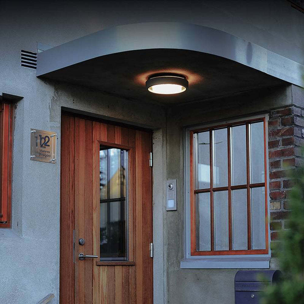 Modern Outdoor Wall Light Black Metal Round LED Sconce - Product example
