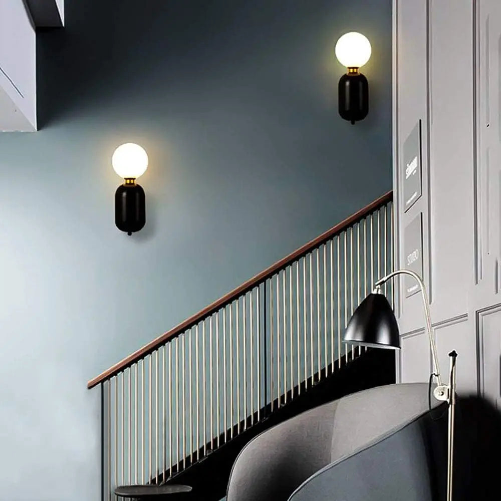 Modern Wall Light Black Metal Globe Sconce - Product example