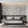 3D leaves wallpaper creating depth in modern living room with natural light highlighting textured pattern