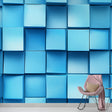 Modern 3D geometric cube wallpaper creating depth in a minimalist living room with clean lines and contemporary furniture