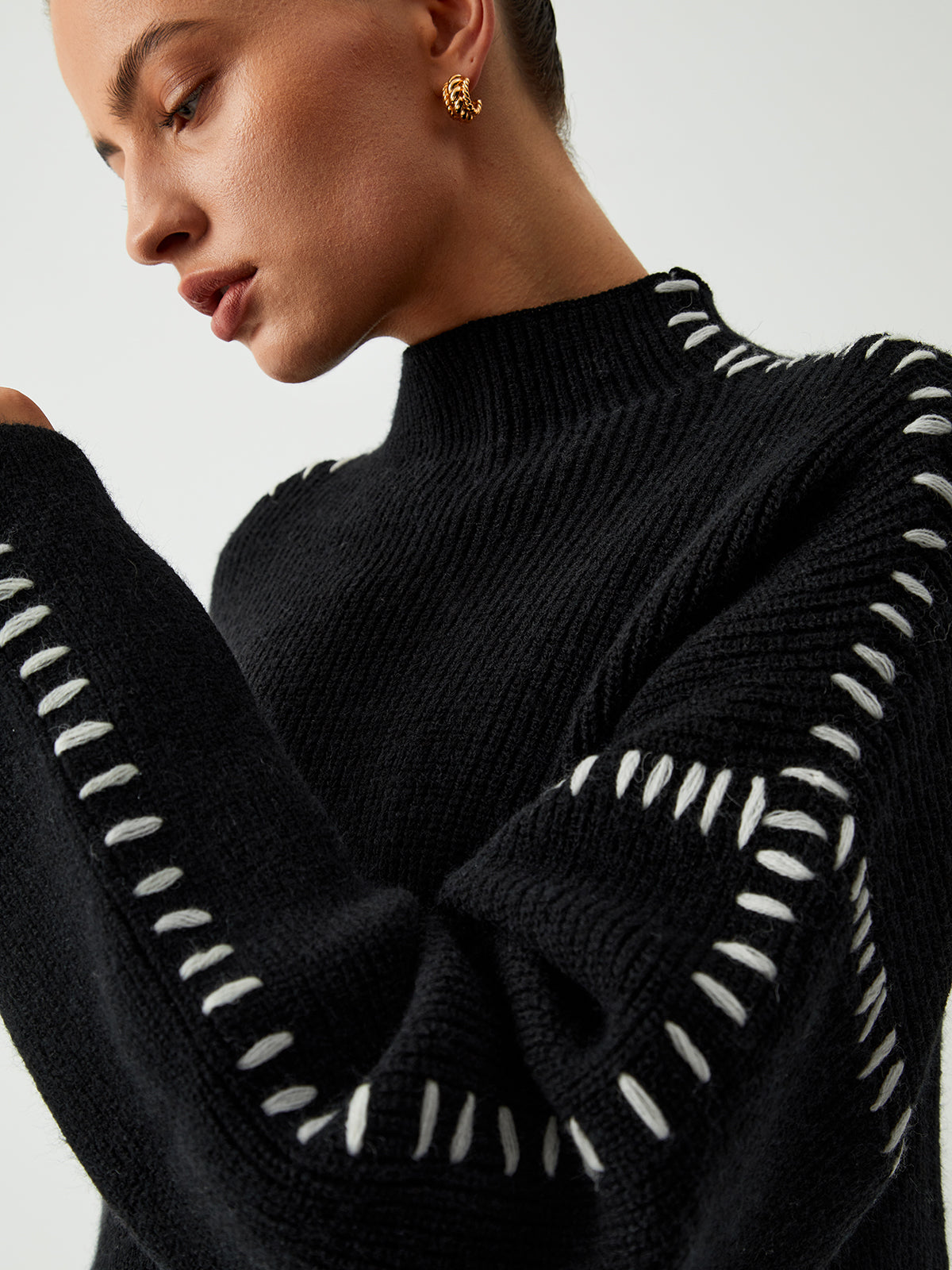 Designer Turtleneck Sweater Oversized Knit With Contrast Stitching - Product example