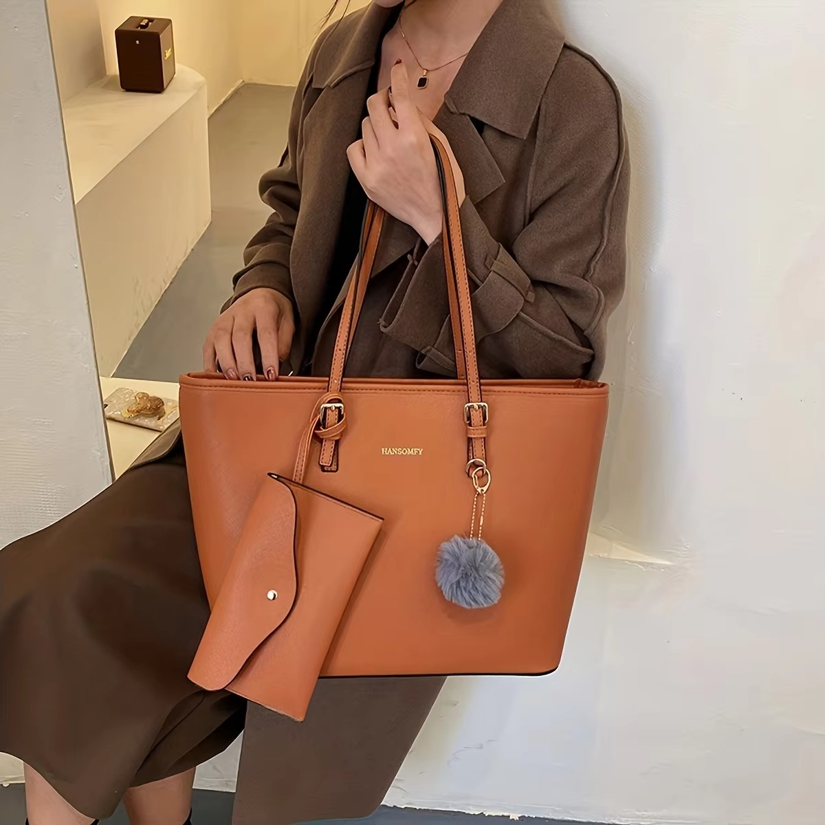 Designer Tote Bag Brown Leather With Pom Charm - Product showcase