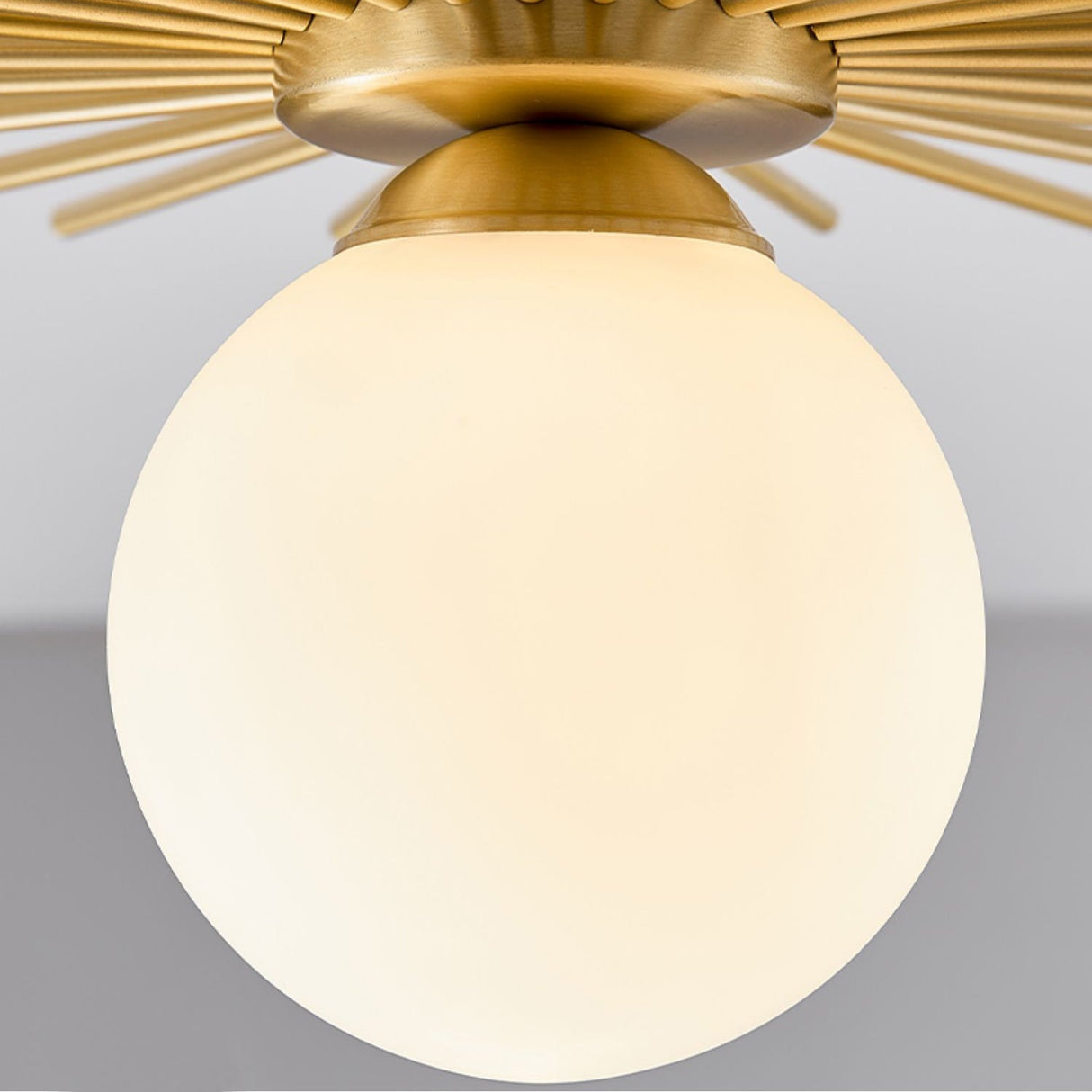 Modern Sunburst Ceiling Light Brass Rays Glass Globe Design - Product example