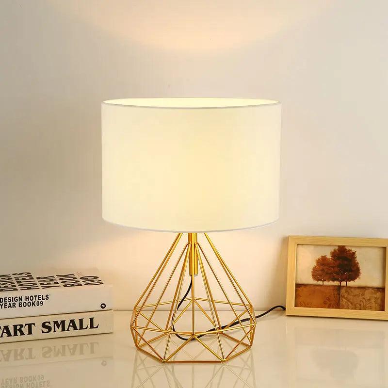 Geometric Table Lamp Gold Metal Base with Cream Shade - Product example