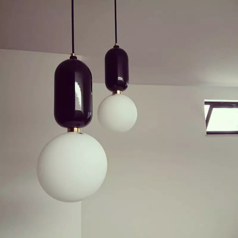 Modern Orb Pendant Light Black Metal Glass Sphere Design - Product example