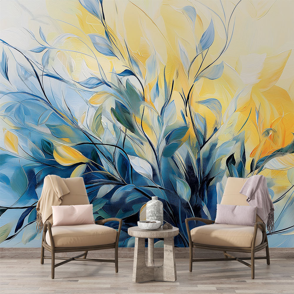 Abstract floral wallpaper with blue and yellow leaves shown in a bright modern living room setting with minimal furniture