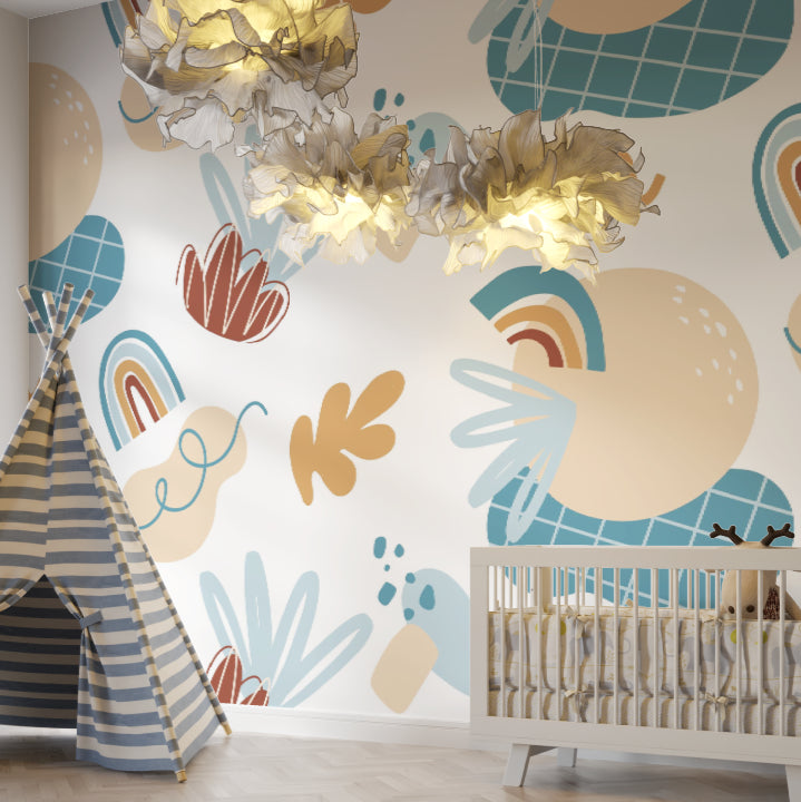 Modern rainbow kids wallpaper in a bright nursery with white furniture and natural light