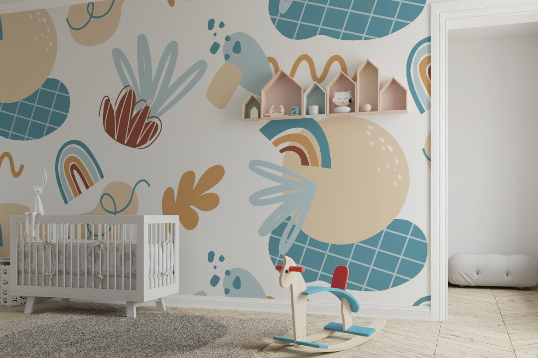 Rainbow nursery wallpaper creating a calm reading corner with rocking chair