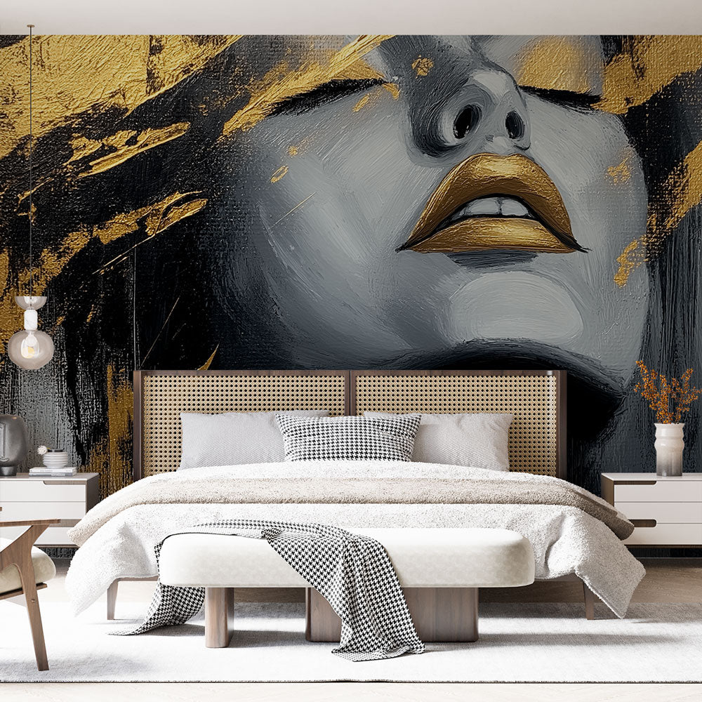 Black and gold abstract portrait mural wallpaper creating drama in a modern living room with minimal furniture