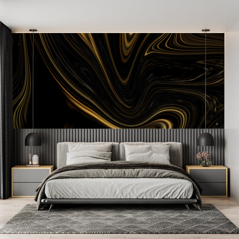 Black and gold abstract wave wallpaper creating drama in a modern living room with minimal furniture
