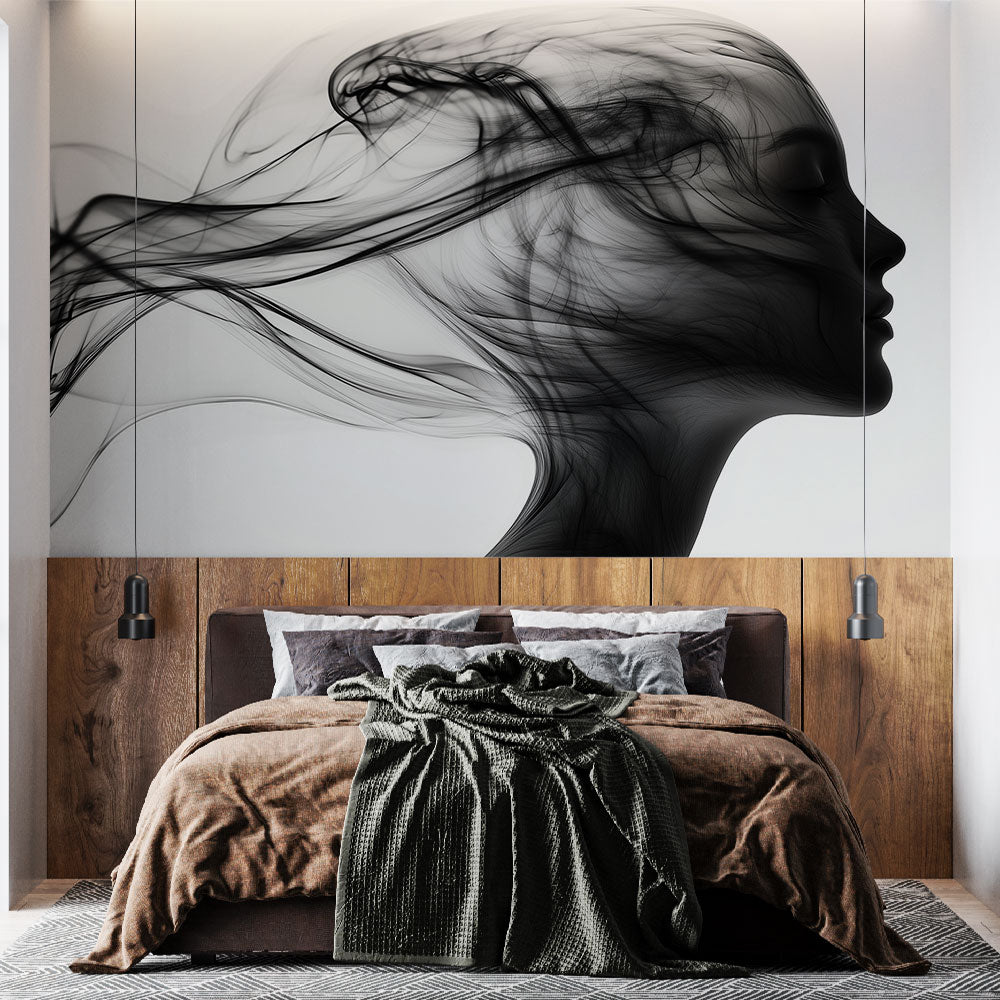 Black and white abstract portrait mural wallpaper creating depth in a modern living room with minimal furniture