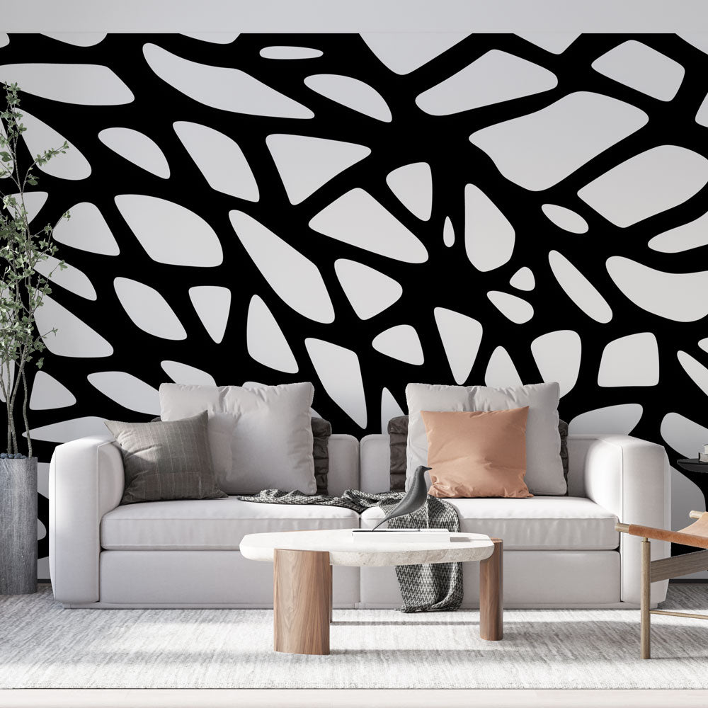 Modern Abstract Geometric Wallpaper creating dramatic impact in a minimalist living room with high ceilings