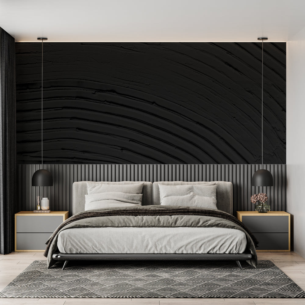 Textured black wave mural making statement in minimalist dining room