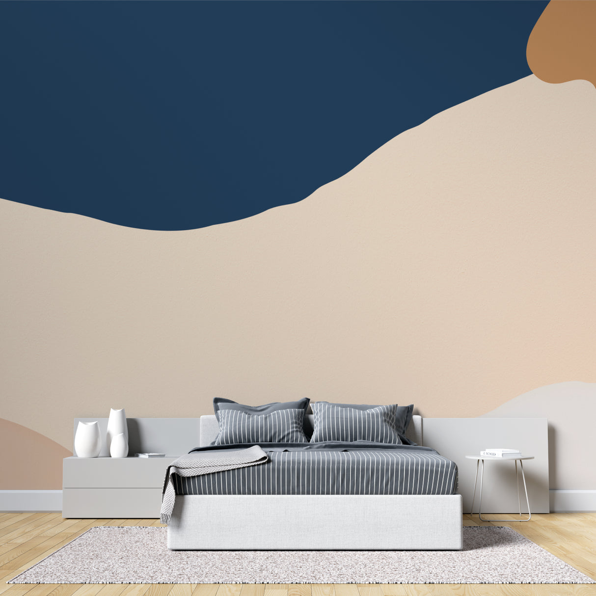 Home office featuring abstract wave mural in blue and terracotta tones