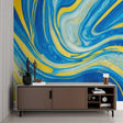 Blue and yellow abstract wallpaper creating a stunning focal point in a modern living room