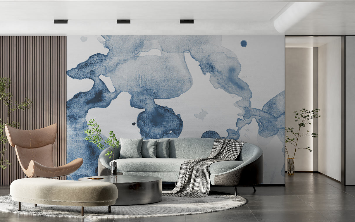 Abstract blue watercolor mural in minimalist bedroom creating serene atmosphere