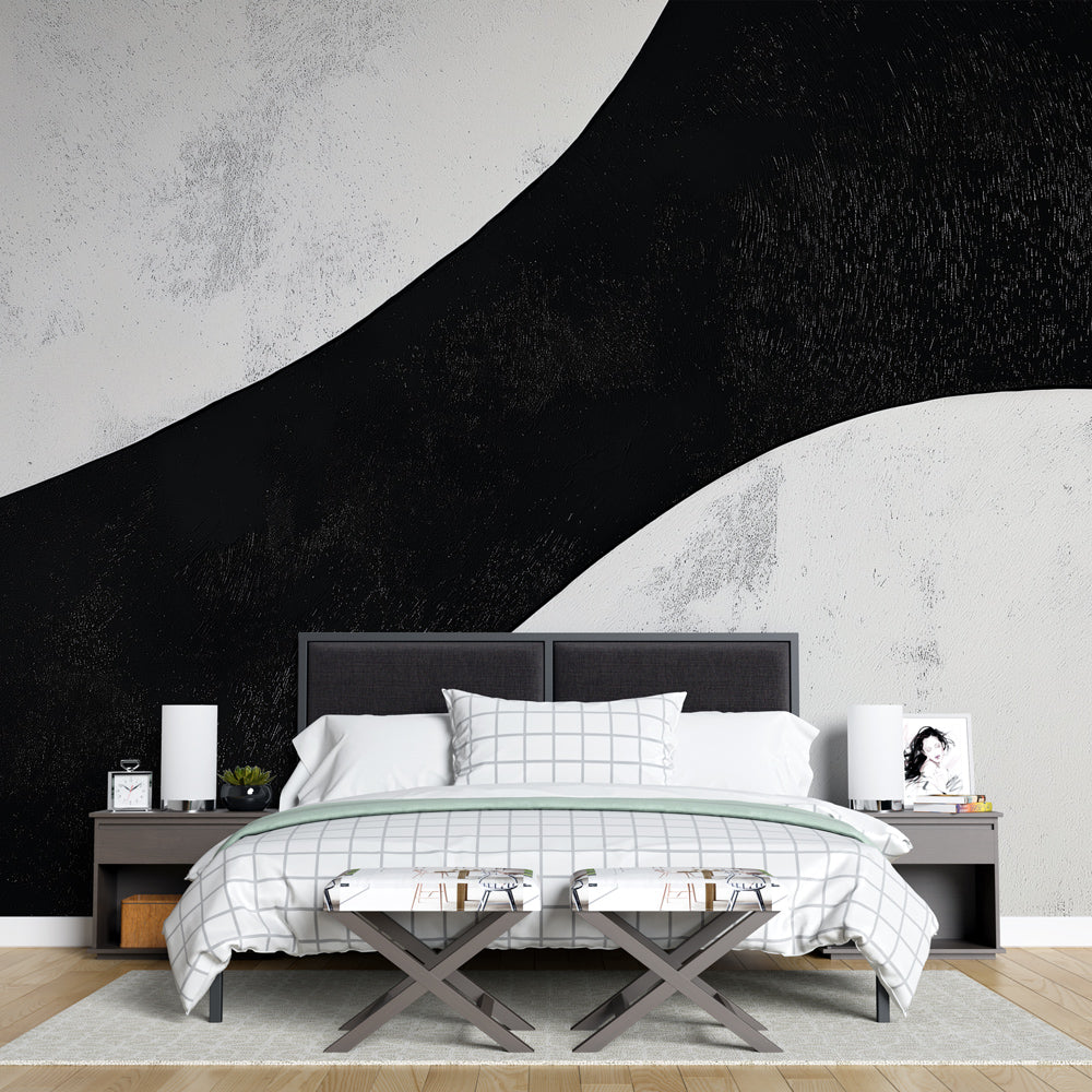 Abstract black and white curved wallpaper making a bold statement in a modern living room with minimal furniture