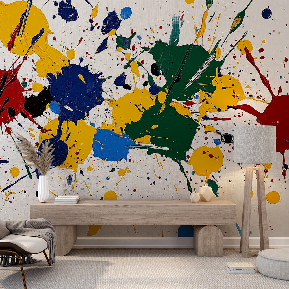 Abstract paint splash wallpaper creating bold statement in modern living room with white furniture and natural light