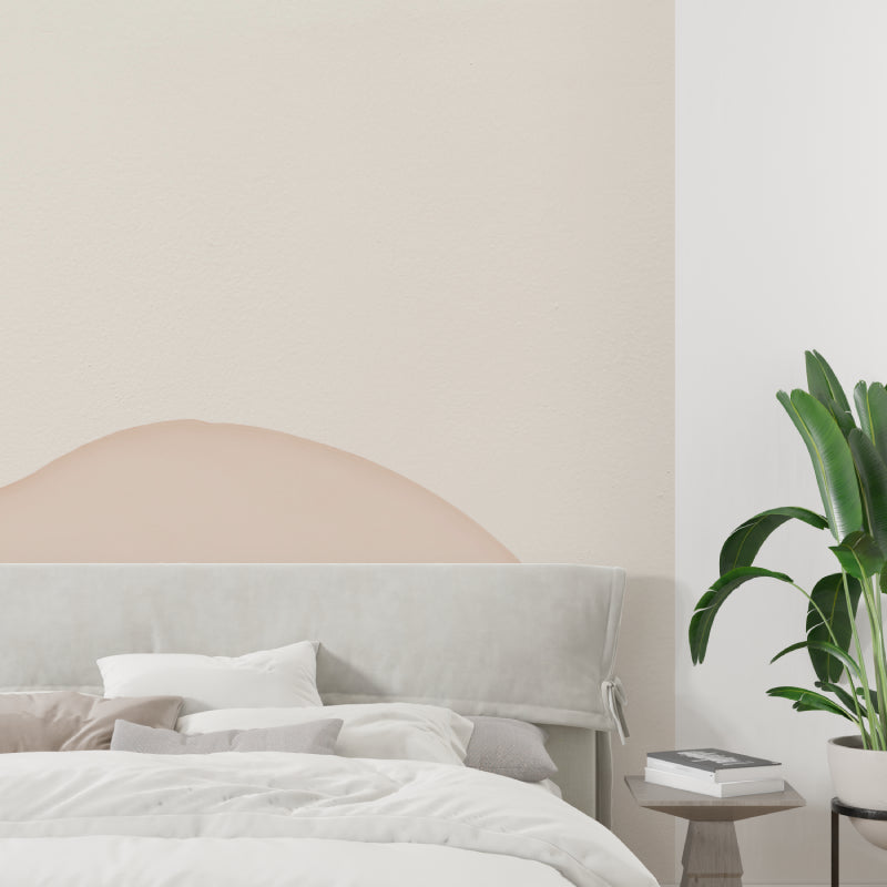 Home office space with minimalist beige arch wallpaper creating focus wall