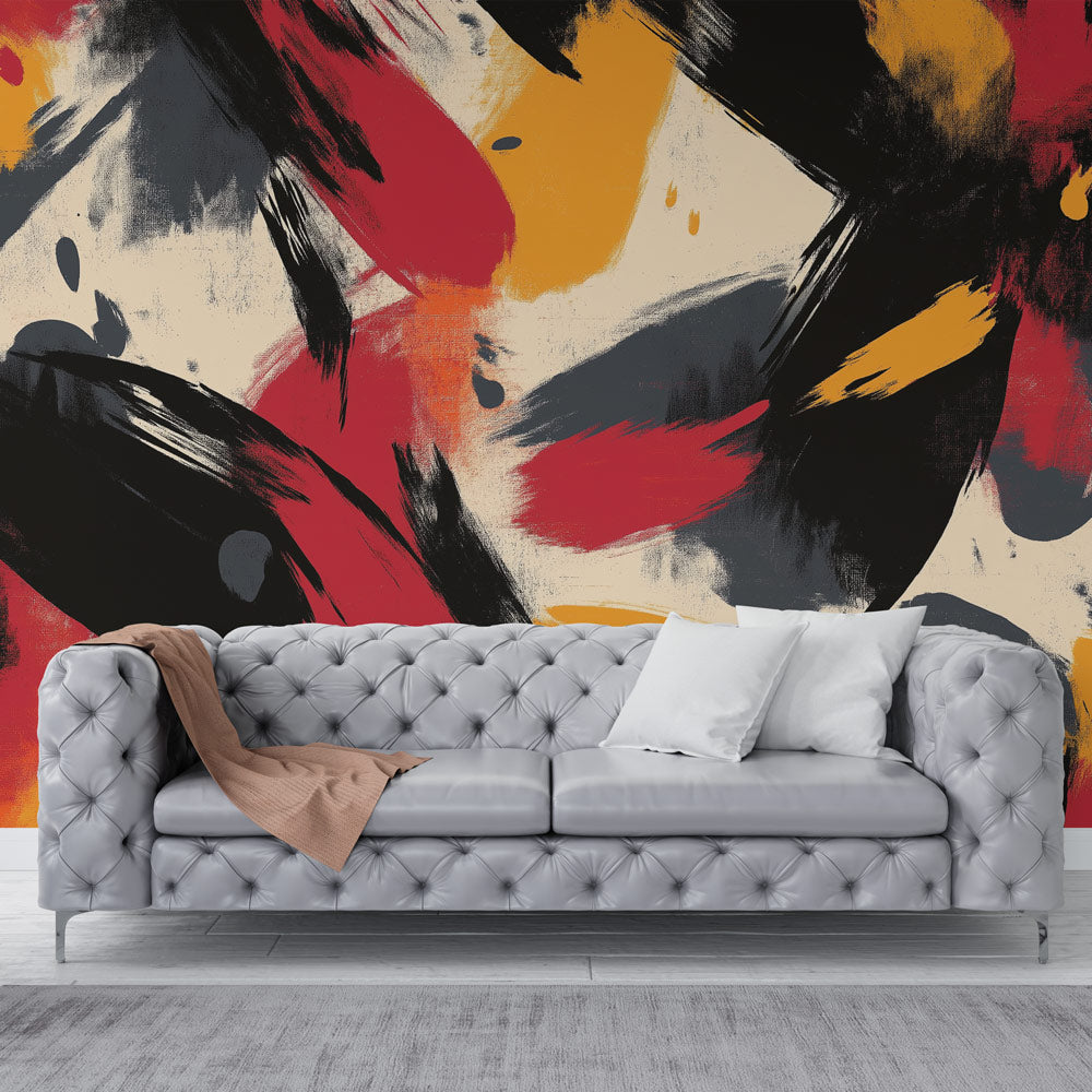 Abstract red and gold wallpaper mural creating drama in a modern living room with natural lighting