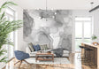 Grey abstract watercolor wallpaper in modern living room creating a peaceful atmosphere