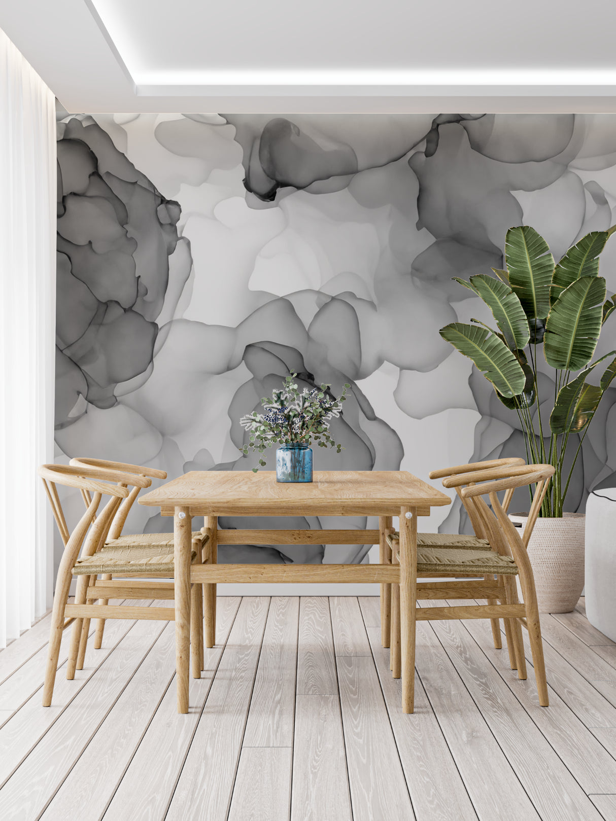 Dining room showcasing grey abstract mural wallpaper in natural light