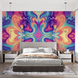 Abstract fluid rainbow wallpaper bringing vibrant energy to a modern living room with white furniture