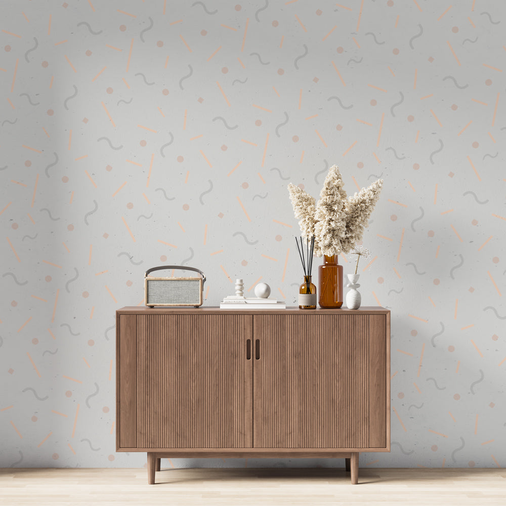 Abstract geometric wallpaper with coral waves and dots pattern styled in a bright modern living room setting