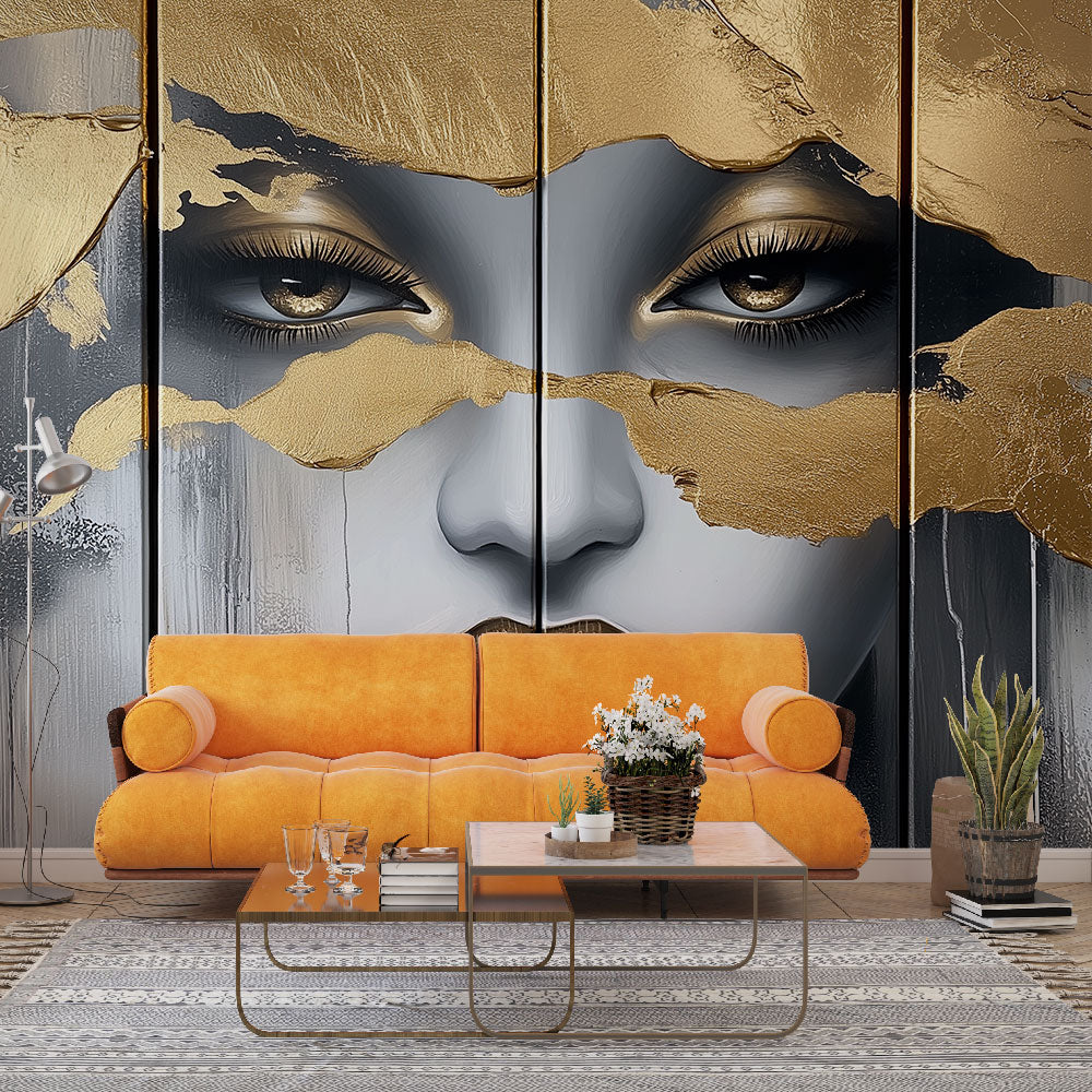 Modern abstract portrait wallpaper with gold accents creating drama in a minimalist living room setting