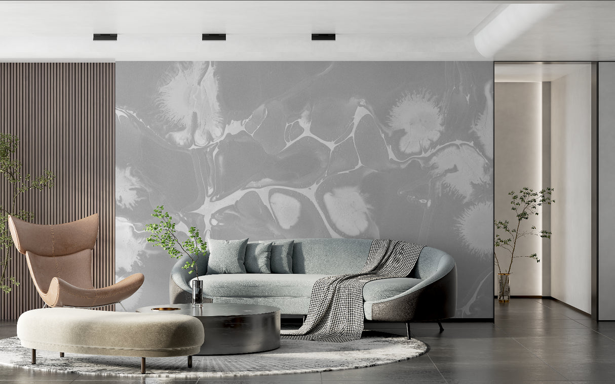 Modern grey marble wallpaper in a bright living room, creating an elegant feature wall behind a white sofa