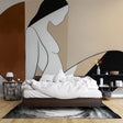 Abstract line art wallpaper in modern living room showing minimalist silhouette design against terracotta and beige background