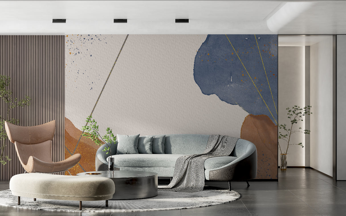 Modern abstract wallpaper with gold and navy tones creating drama in a minimalist living room