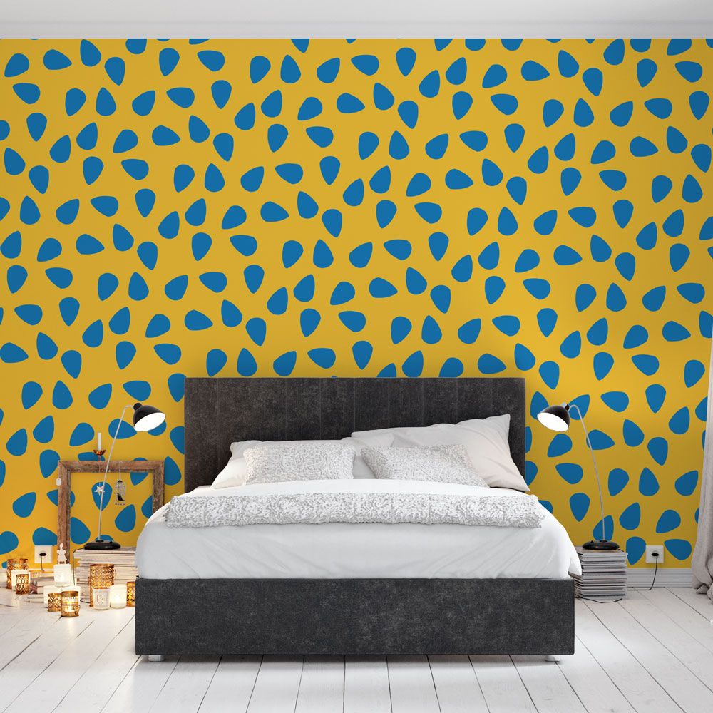 Modern blue dots abstract wallpaper bringing life to a bright minimalist living room with contemporary furniture