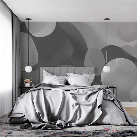 Modern grey circular wallpaper in bright living room setting with minimalist furniture
