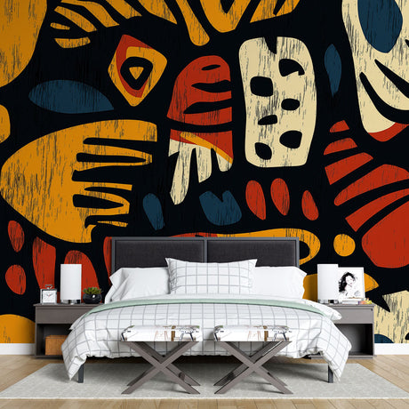 Modern geometric art wallpaper with terracotta and gold tones creating a bold statement wall in a minimal living room setting