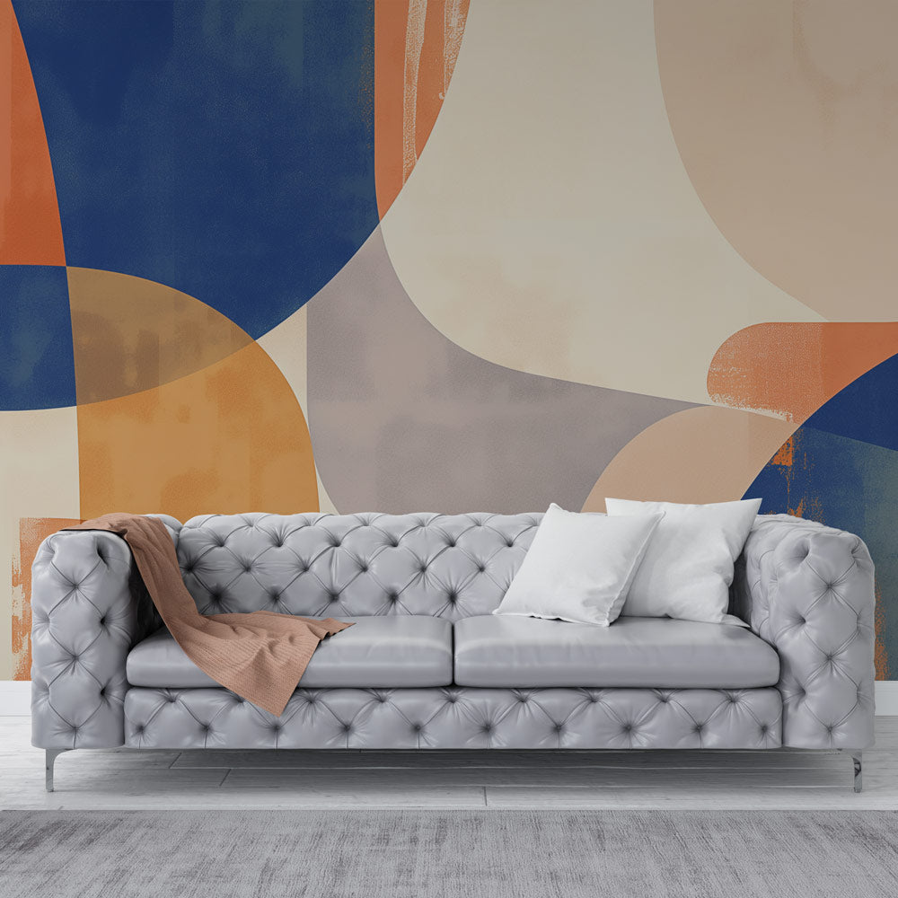 Modern abstract geometric wallpaper with blue and terracotta curves styled in a bright contemporary living room setting