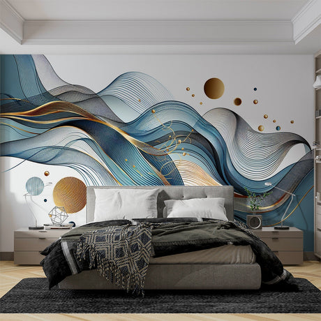 Modern abstract wave wallpaper with gold accents styled in a bright contemporary living room with minimal furniture