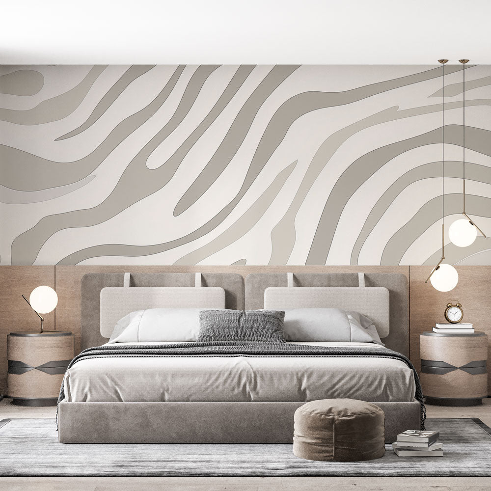Modern grey wave wallpaper creating a calm atmosphere in a minimalist living room with natural light