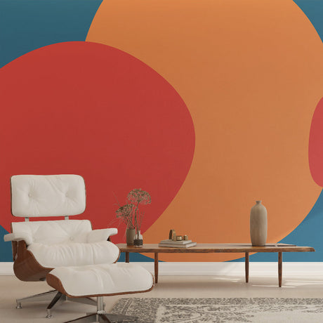 Abstract circle wallpaper in coral and blue tones creating a calm atmosphere in a modern living room setting