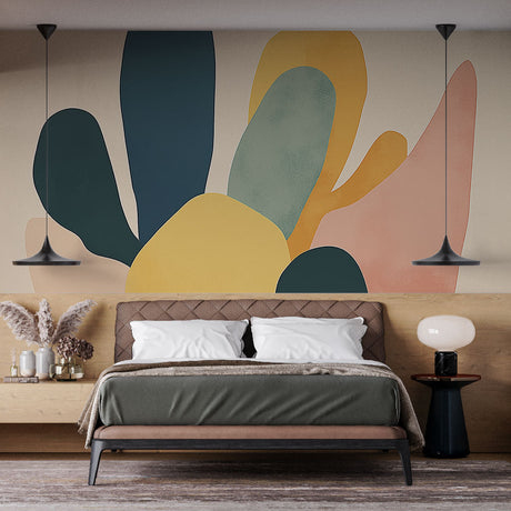 Abstract organic shapes wallpaper in green and gold creating a modern statement wall in a bright living room setting
