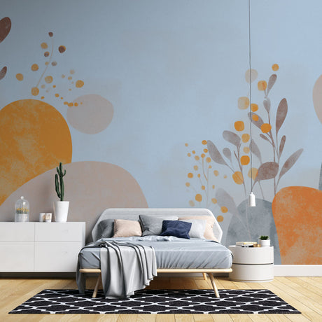 Abstract floral wallpaper with orange blooms creating a modern statement wall in a bright living room setting