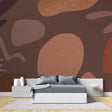Modern living room with Abstract Terracotta Wallpaper creating warm, inviting atmosphere