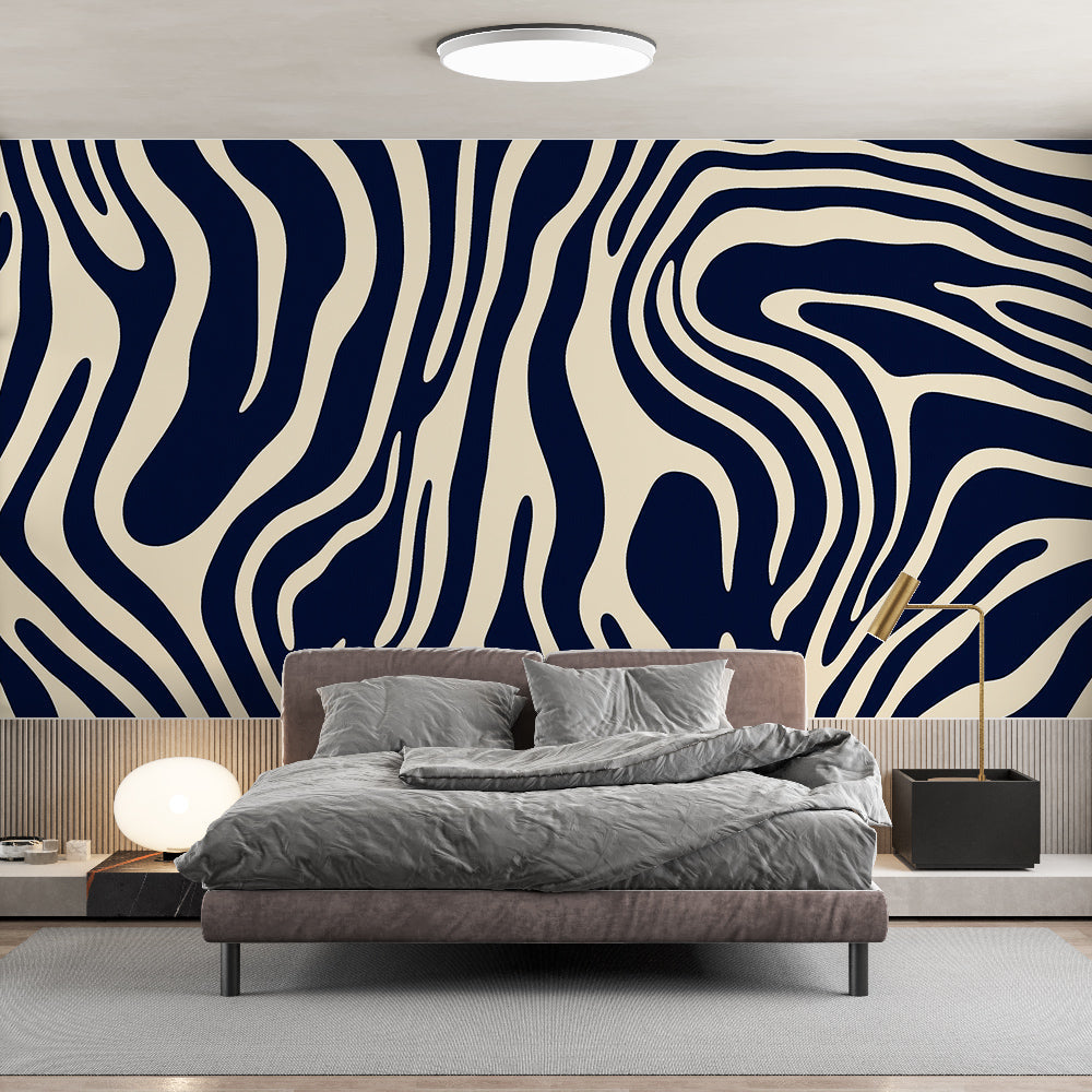 Abstract wave wallpaper in navy and beige creating movement in a modern living room with minimal furniture