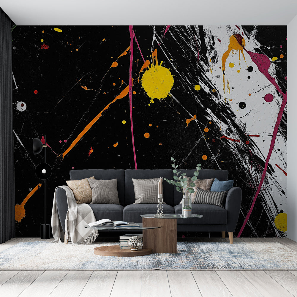 Abstract paint splash wallpaper creating dramatic impact in modern living room with black sofa and minimal decor