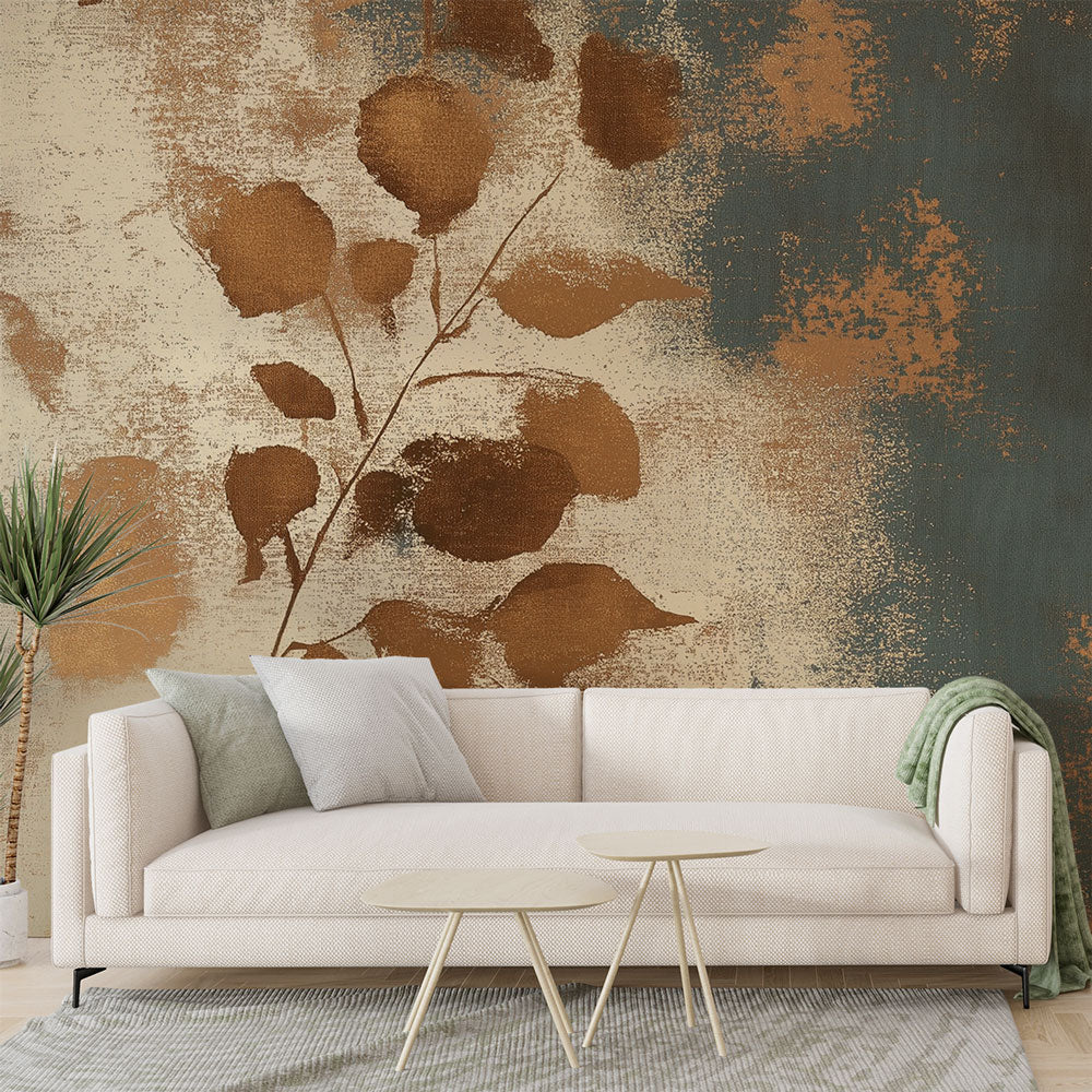 Terracotta and gold abstract leaf wallpaper creating a warm atmosphere in a modern living room with natural light
