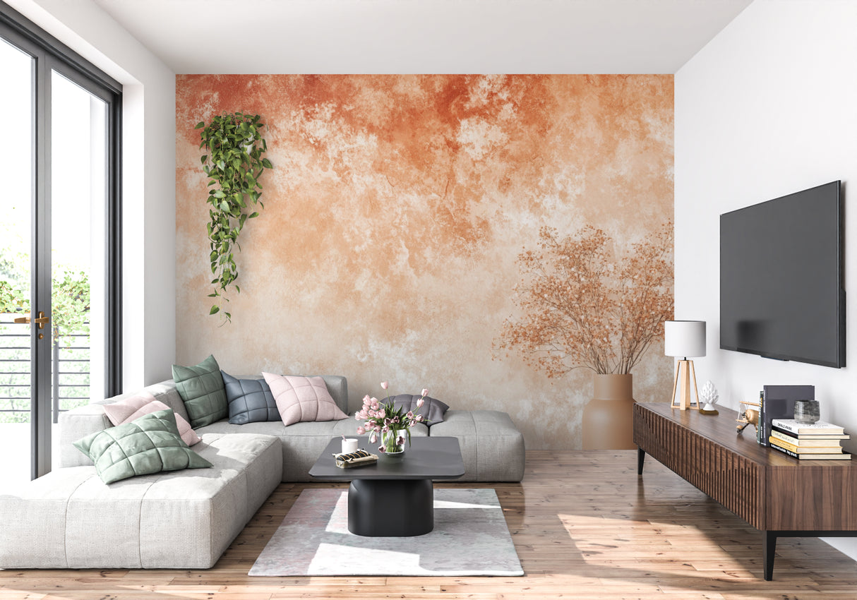 Artistic terracotta wall mural in a sunny hallway showing color transitions