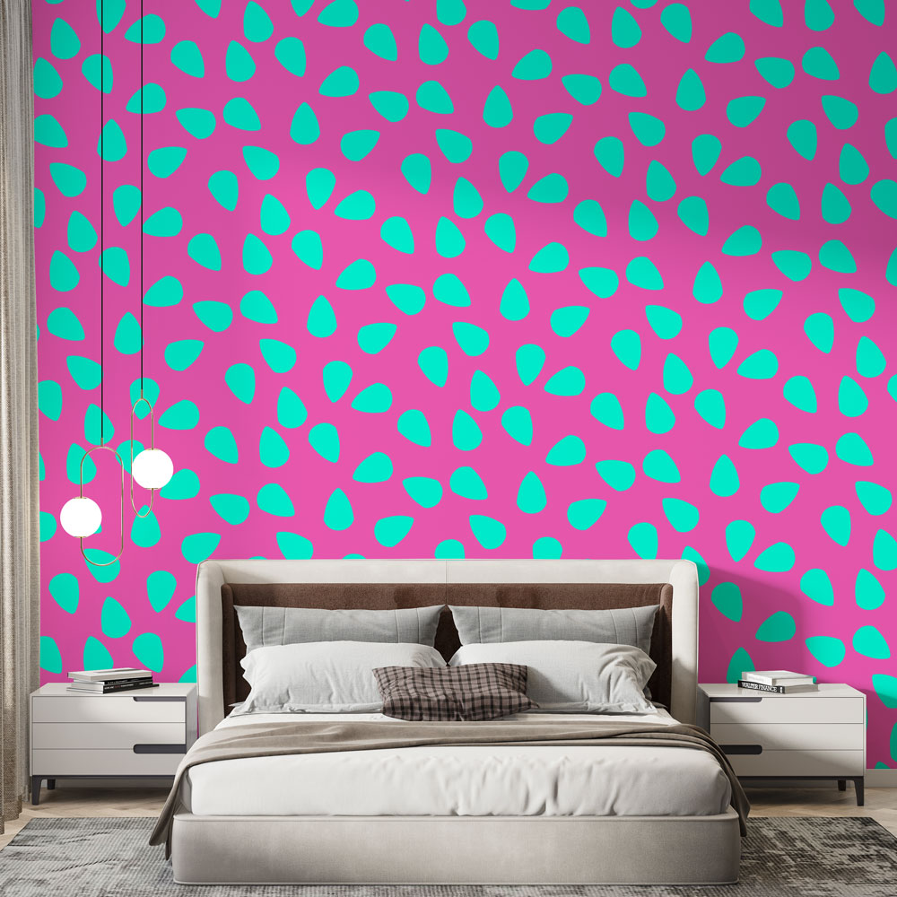 Modern abstract wallpaper with turquoise drops on pink background shown in a bright living room setting