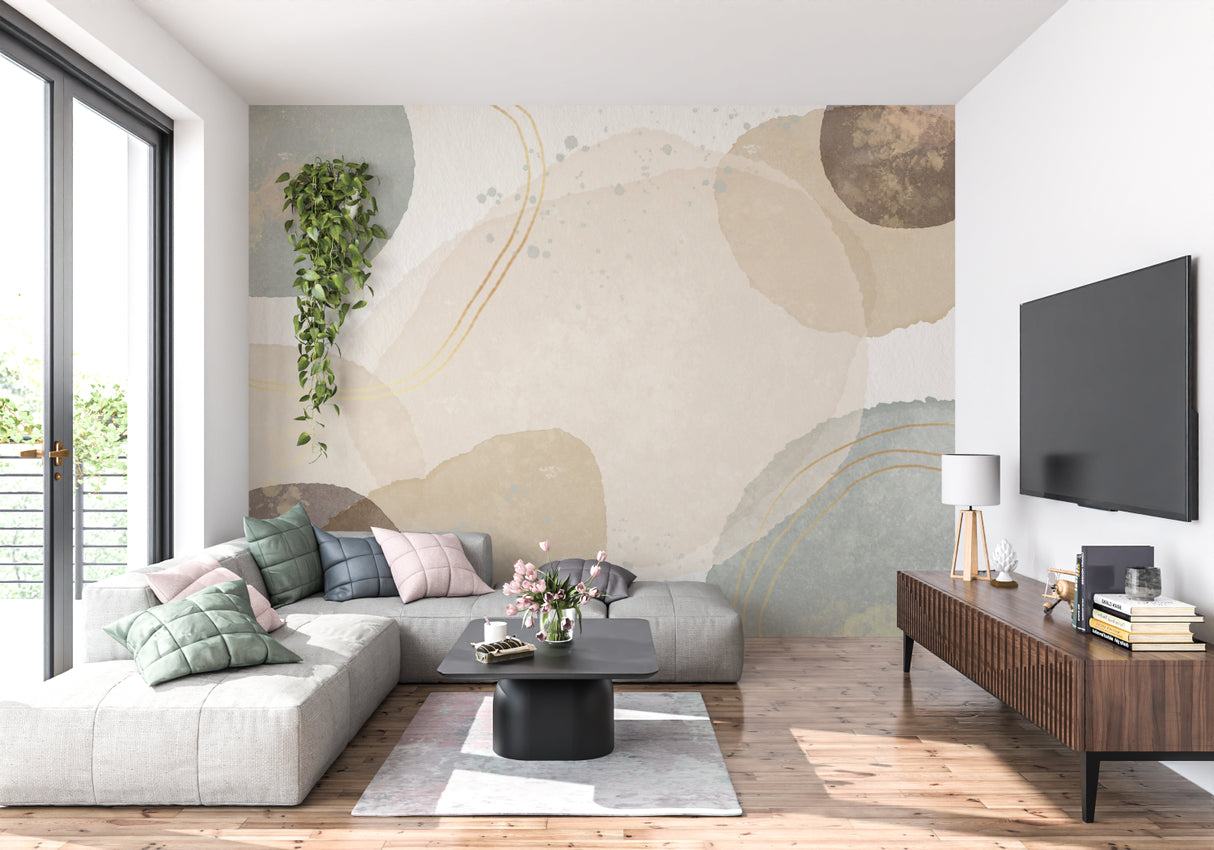 Home office space with abstract watercolor wall mural in calming beige and sage tones