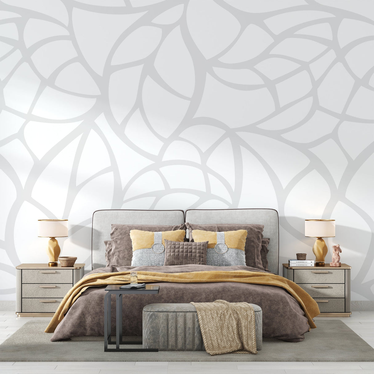 Modern white leaf pattern wallpaper creating a bright, airy feel in a minimalist living room setting